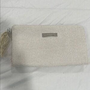 Dazzling White Clutch by [Brand]